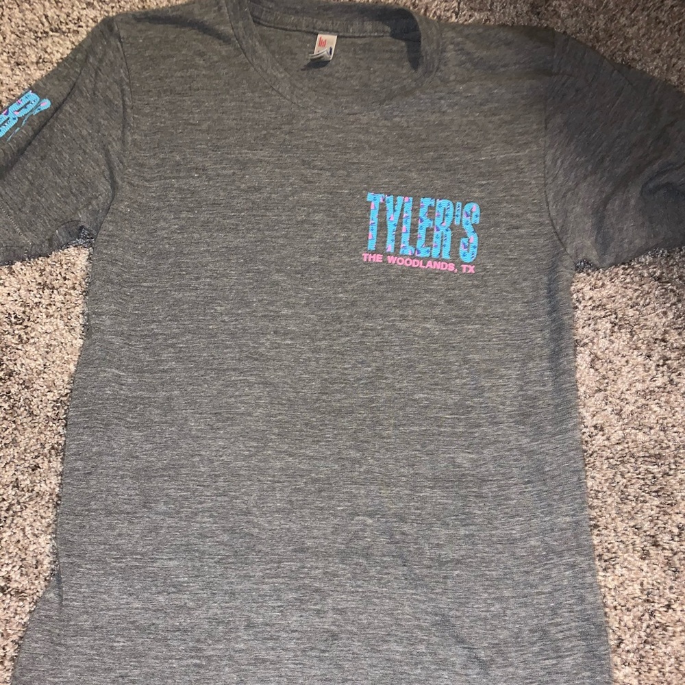 A grey tyler’s shirt